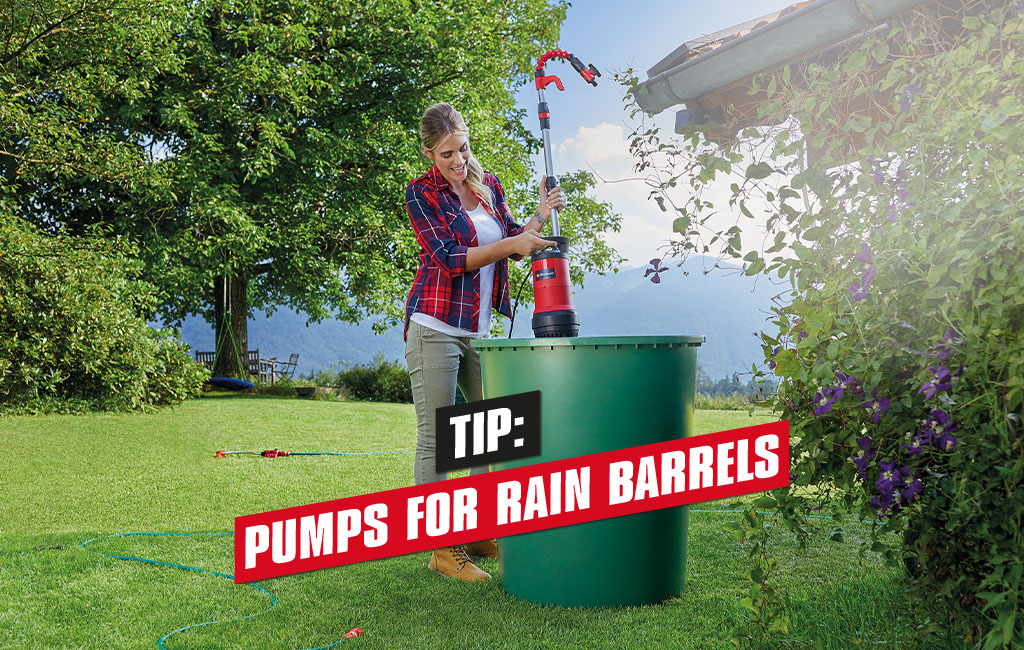 A woman placing a rain barrel pump with flexible gooseneck into a green rain barrel. | text: tip: pumps for rain barrels