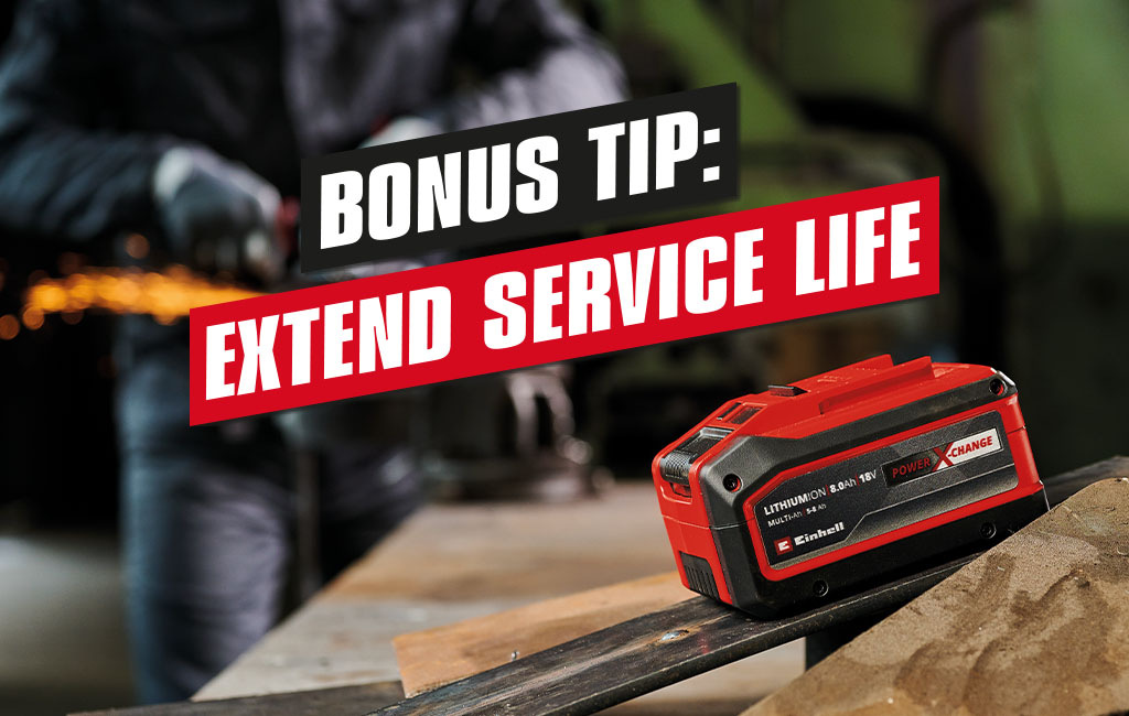 An Einhell Multi-Ah battery is placed on a workbench in a workshop | Text: Bonus Tip - Extend service life