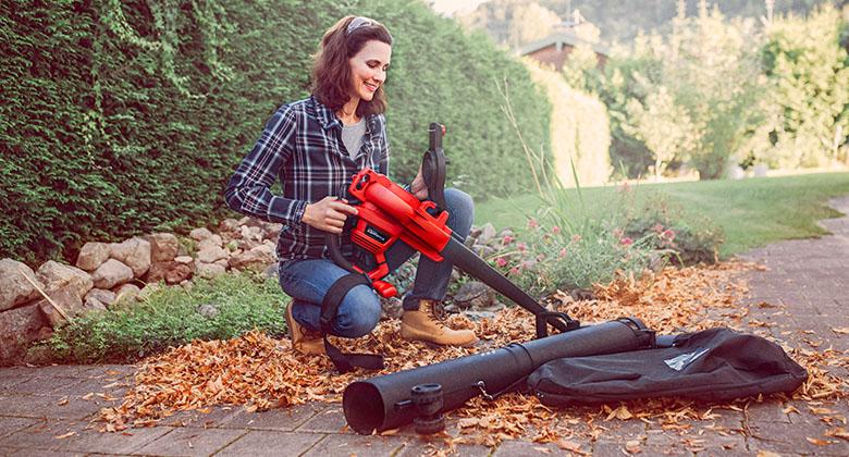 woman with a leaf blower