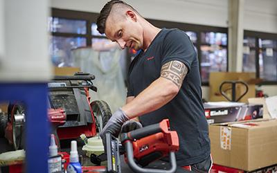 A man using an Einhell device.